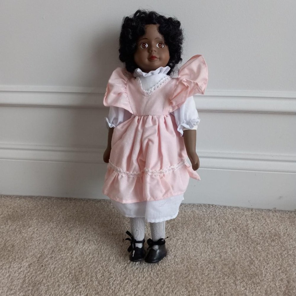 African American Porcelain Doll in the original box.